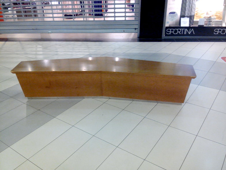 Bench in a shoping mall hall