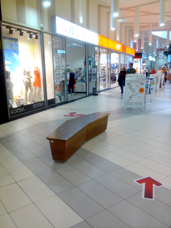 Bench in a shoping mall hall
